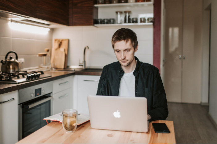 man using laptop